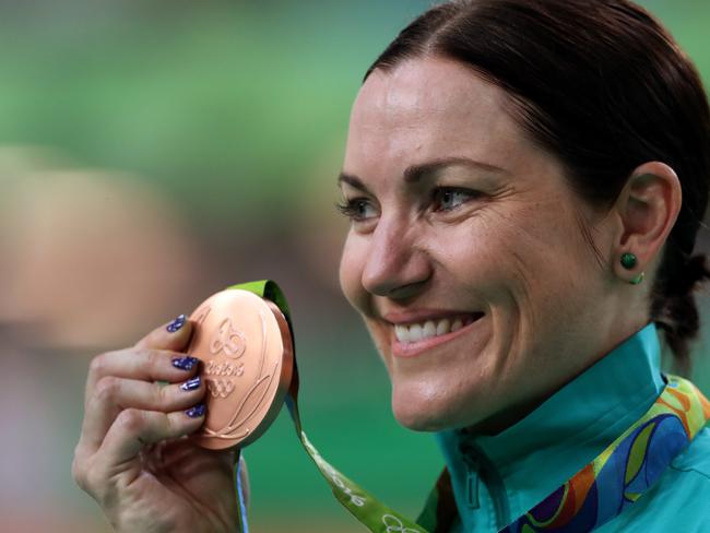 Anna Meares celebrates after winning bronze in keirin. Picture: Adam Head