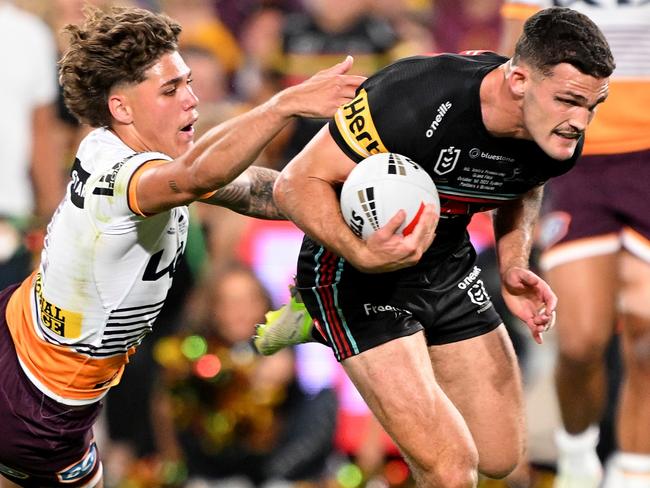 SYDNEY, AUSTRALIA - OCTOBER 01: Nathan Cleary of the Panthers gets past Reece Walsh of the Broncos before scoring a try during the 2023 NRL Grand Final match between Penrith Panthers and Brisbane Broncos at Accor Stadium on October 01, 2023 in Sydney, Australia. (Photo by Bradley Kanaris/Getty Images)