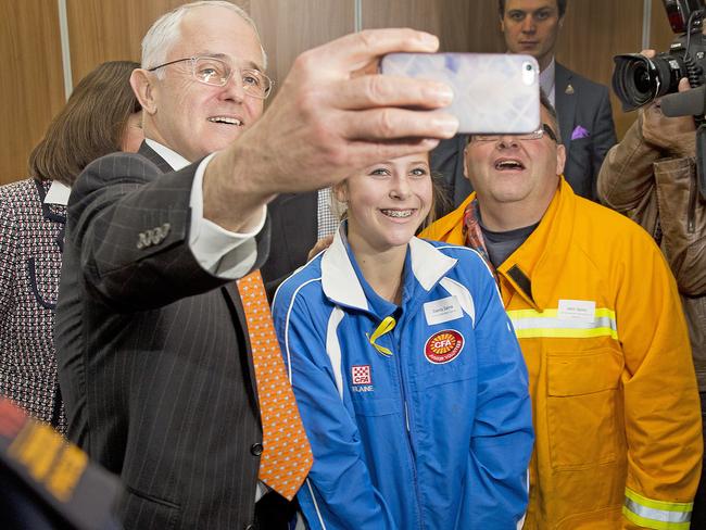 Prime Minister Malcolm Turnbull poses for a selfie with 15-year-old junior Elaine CFA member Darcy Zaina and her father John during the PM's visit to Geelong on Thursday, June 23rd, 2016. Picture: Nathan Dyer