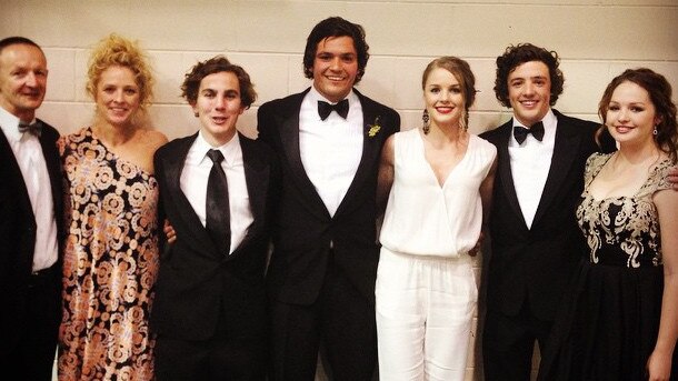 Souths rising star Burns and his family and friends at a school formal. Picture: Instagram @braidonburnsss