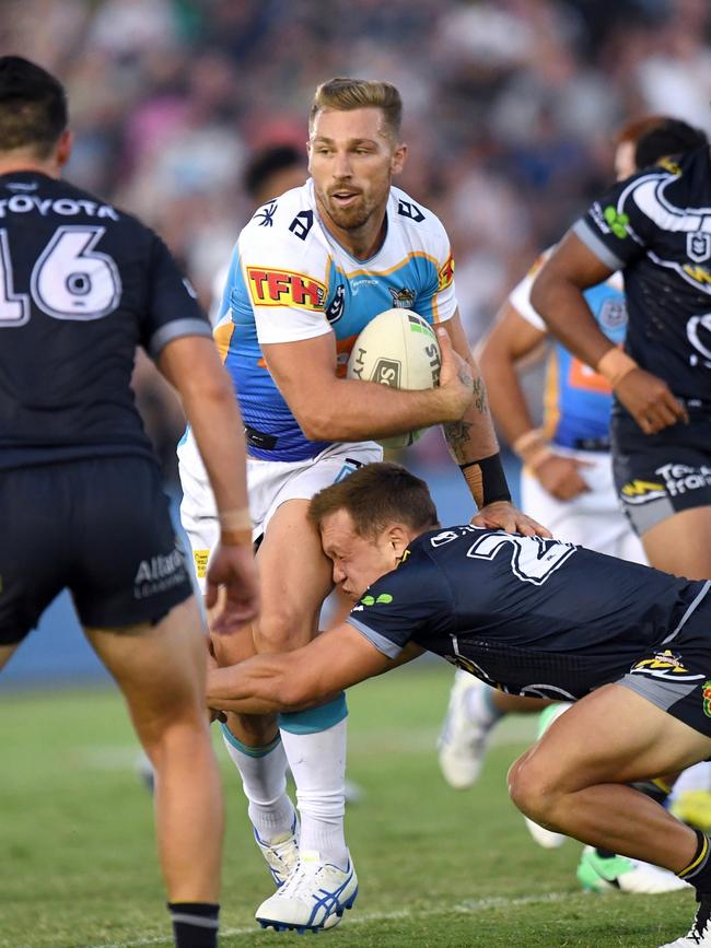 Bryce Cartwright runs the ball during Gold Coast’s trial against Norths Queensland at Sunshine Coast Stadium. Picture: NRL Photos