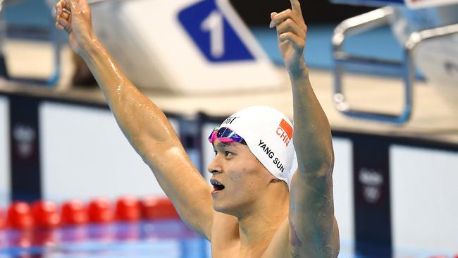 Sun Yang of China celebrates winning the Men's 200m Freestyle final at the Olympic Aquatics Stadium on day three, of the Rio 2016 Olympic Games in Brazil, Monday, Aug. 8, 2016. (AAP Image/Lukas Coch)