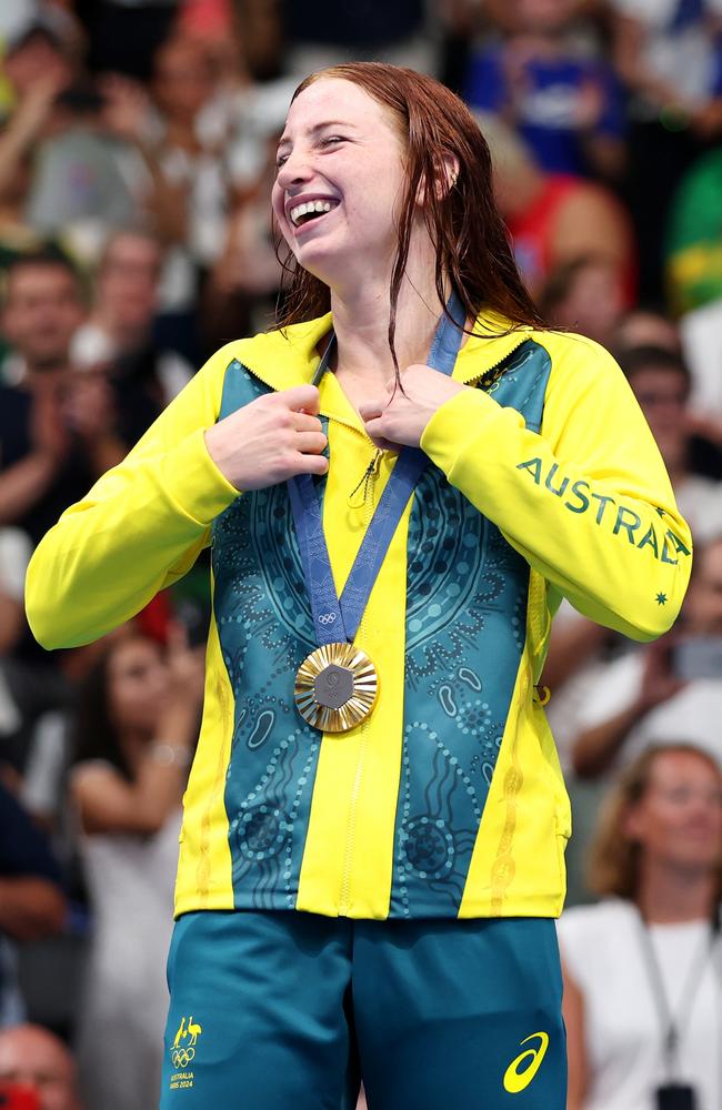 Mollie O'Callaghan celebrates on the podium after winning the 200m freestyle at the Paris Olympics. Picture: Getty Images