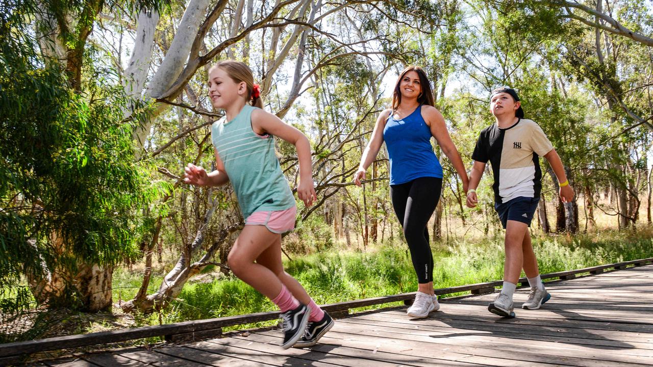 Natasha Drury of Morphett Vale with her daughter Briella, 8, and son Harley walking on the Minkarra Trail at Flagstaff Hill. Picture: Brenton Edwards