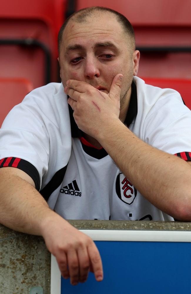 A Fulham fan shows how much his side's relegation truly means.