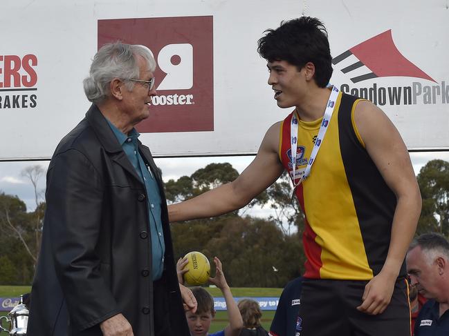 Josh Lai (R) accepts the Jim Meneilly Medal for best on ground. Picture: Andrew Batsch