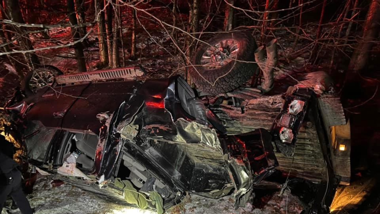 Officers noticed a damaged section of guardrail and saw a badly damaged pick-up truck that had rolled over. Picture: New Hampshire State Police/Facebook