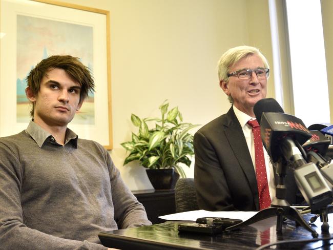 Lawyer Stephen Kenny, right, and Cassandra Sainsbury's fiance Scott Broadbridge, left, address the press.