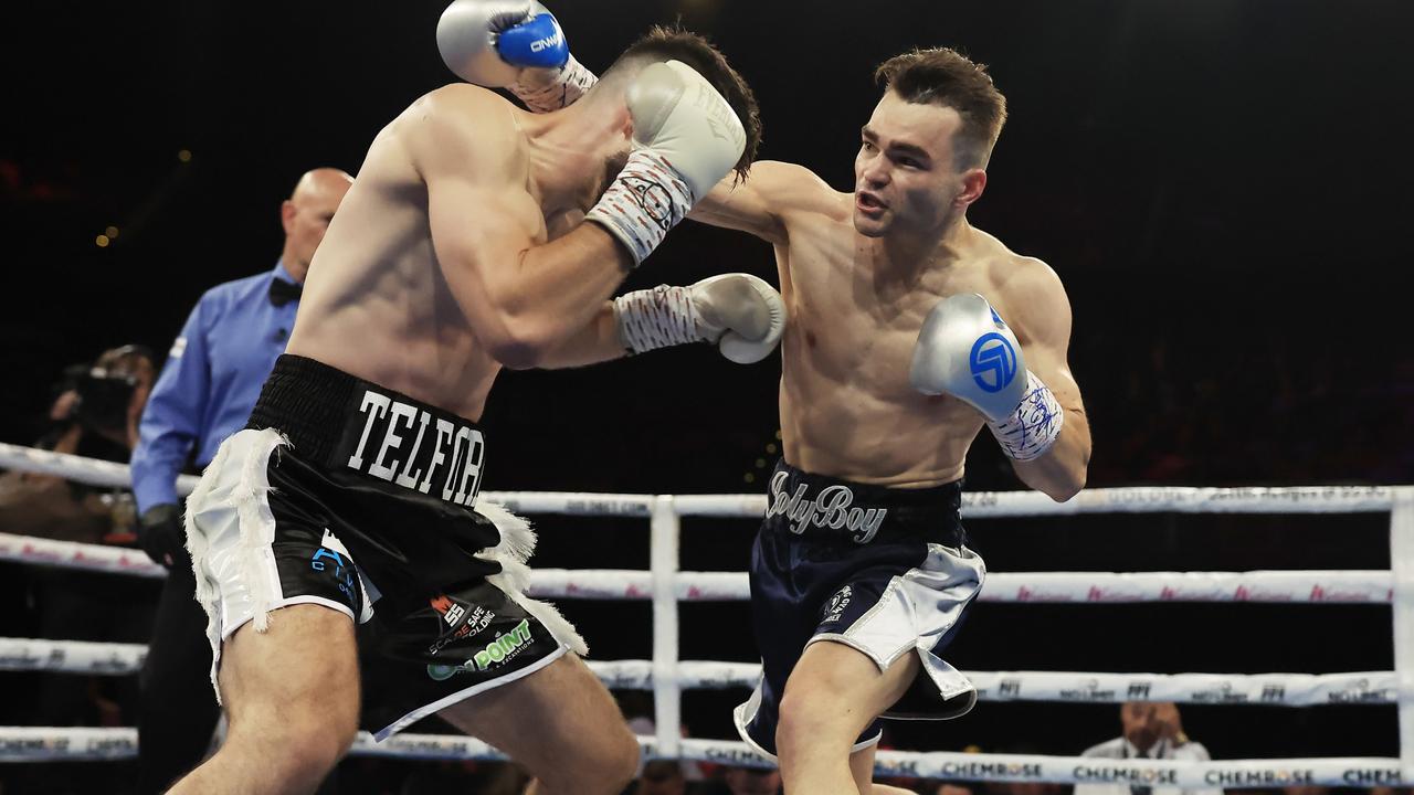 Joel Taylor trades punches with Ty Telford (left) in their welterweight fight. Picture: Mark Evans/Getty Images