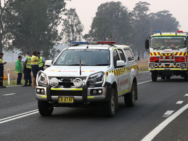 A roadblock due to bushfires near Busbys Flat, northern NSW, Wednesday, October 9, 2019. Fire warnings are in place across parts of northern NSW as out-of-control blazes continue to burn. Up to 30 homes have been lost as bushfires ravaged parts of northern NSW on Tuesday, with the village of Rappville particularly affected. (AAP Image/Jason O'Brien)
