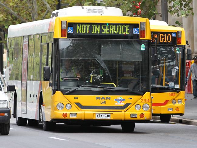 Public transport - Adelaide Metro bus during a ''dead running'' or Ghost run through King William Street, Adelaide. Buses running with a 'not in service' sign are usually travelling between routes.