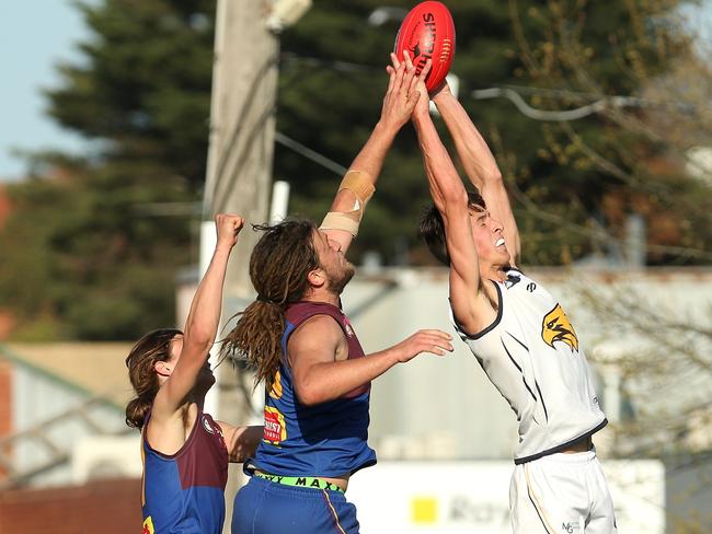 Jaron Murphy marks in front of Devin McDonald and Lachlan Turner. Picture: Hamish Blair