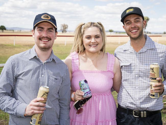 At the Clifton Races are (from left) Charles Milward, Jess Dixon and Jordan Dixon, Saturday, October 28, 2023. Picture: Kevin Farmer