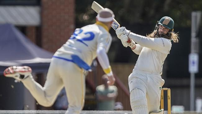 Caulfield batsman David Tantsis-Hall hits out in last season’s grand final against Ormond.