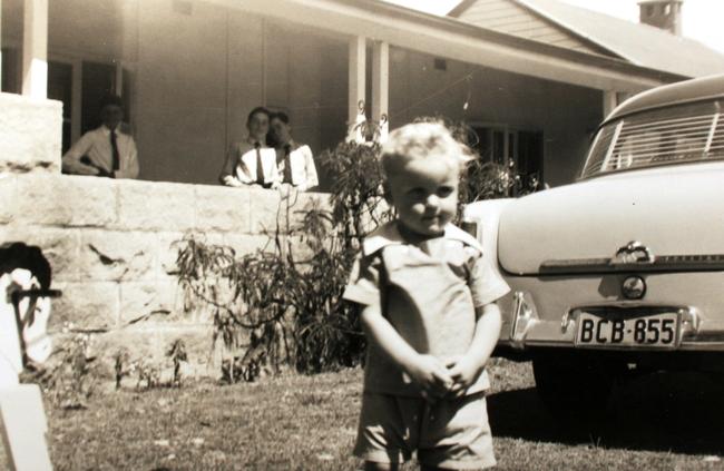 Michael Howard as a toddler, with his older brothers in the background. He grew up never knowing his father. Picture: Supplied