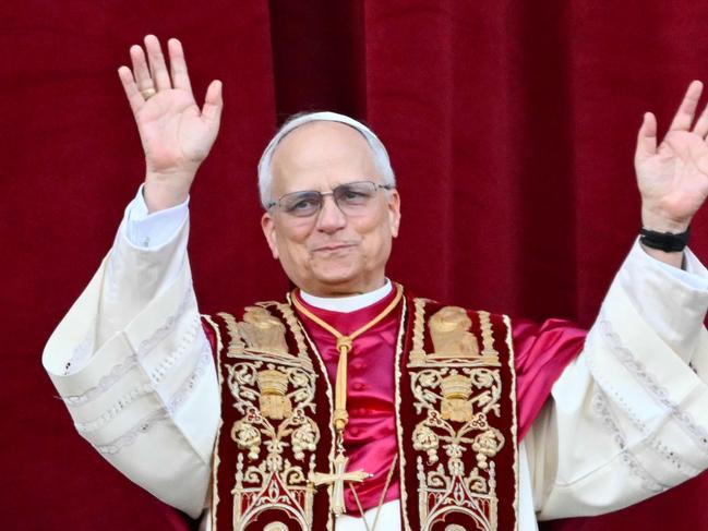 Newly elected Pope Leo XIV, Robert Prevost arrives on the main central loggia balcony of the St Peter's Basilica. Picture: AFP