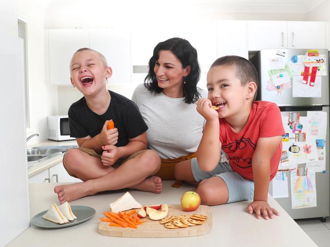 Hayley Ibbotson with sons Asher Stewart, 6, and Levi Stewart, 4, says she makes multiple dinners a night. Picture: Sue Graham.