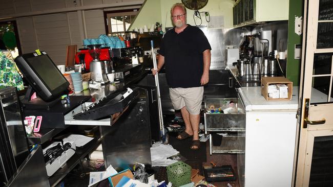 Jason Hanna, owner of Eva’s Botanic Gardens Cafe,   cleans up after after yet another break-in there last year.  Picture: Katrina Bridgeford