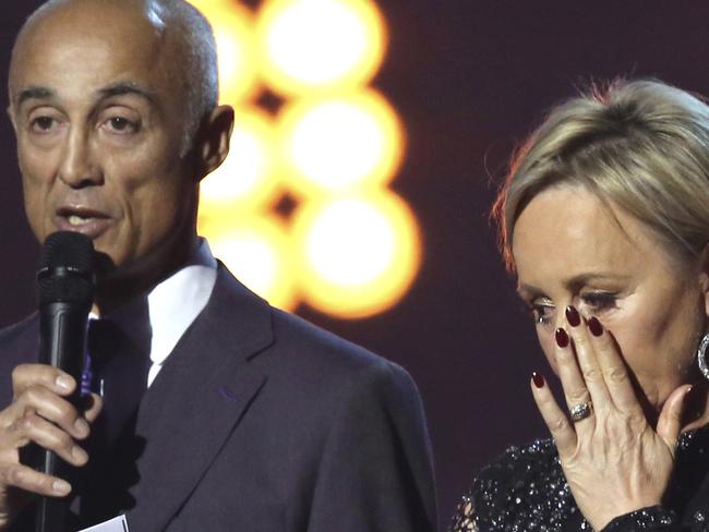 Singers Pepsi DeMacque from left, Andrew Ridgeley and Shirlie Holliman pay homage to George Michael on stage at the Brit Awards 2017 in London, Wednesday, Feb. 22, 2017. (Photo by Joel Ryan/Invision/AP)