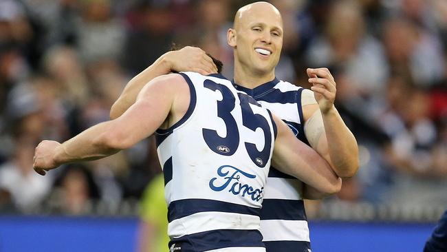 Patrick Dangerfield gets a hug from Gary Ablett. Picture: Michael Klein