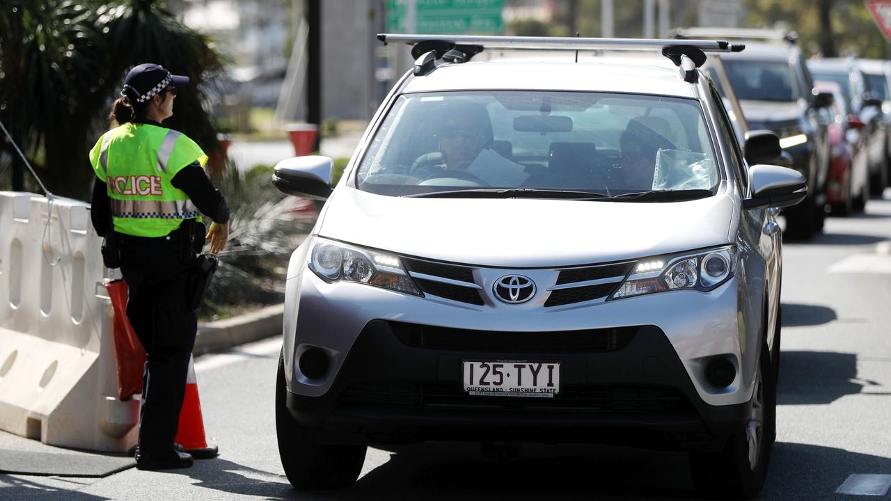 Police at the Queensland border in Coolangatta. Picture: NIGEL HALLETT