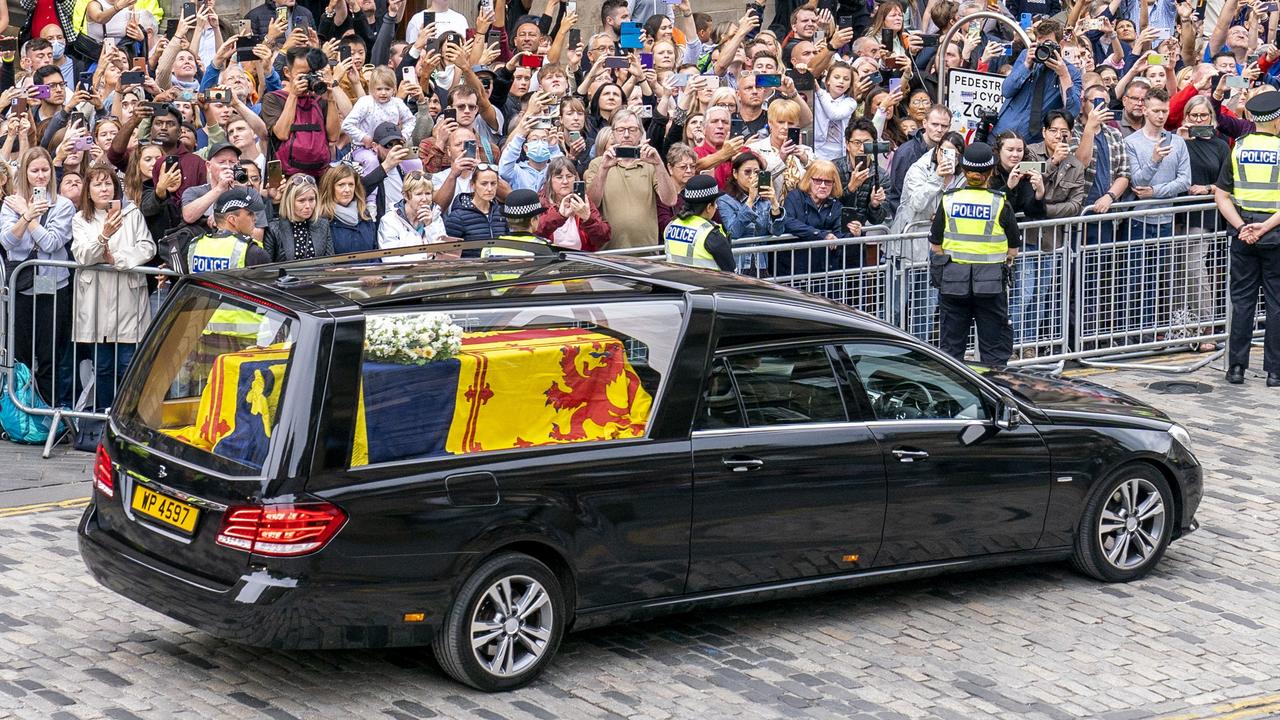 Thousands of people lined the streets to see the Queen’s coffin pass by. Picture: Getty Images.