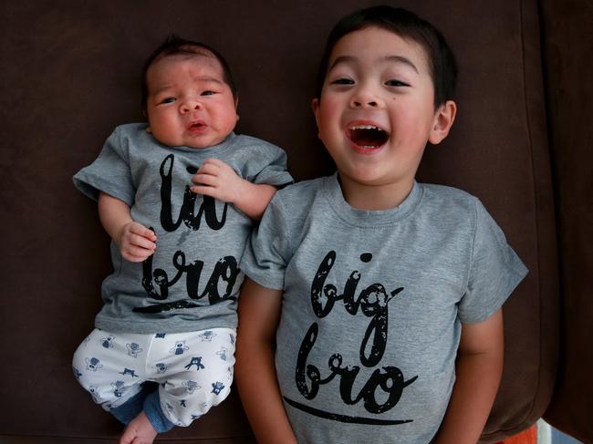 Brothers Owen (left) and Riley Hicks were born three years apart although they were conceived at the same time. Picture: Toby Zerna