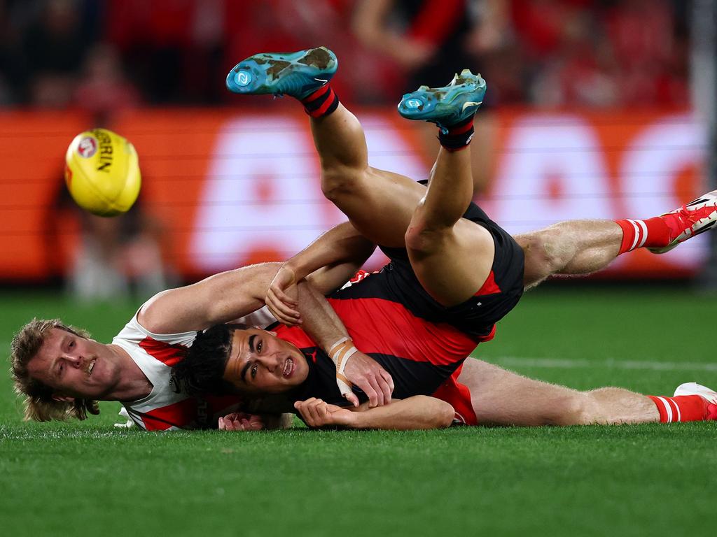While Nick Blakey brings Isaac Kako down. Picture: Morgan Hancock/Getty Images