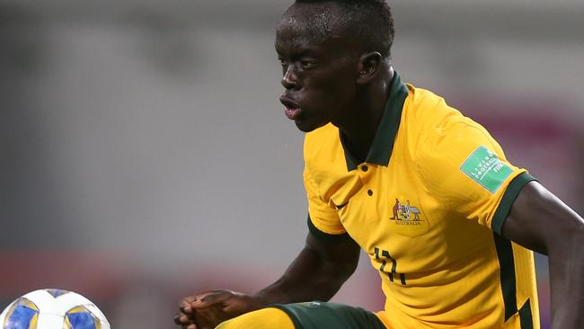 DOHA, QATAR - SEPTEMBER 02: Awer Mabil of Australia controls the ball during the 2022 FIFA World Cup Qualifier match between Australia and China PR at Khalifa International Stadium on September 02, 2021 in Doha, Qatar. (Photo by Mohamed Farag/Getty Images)