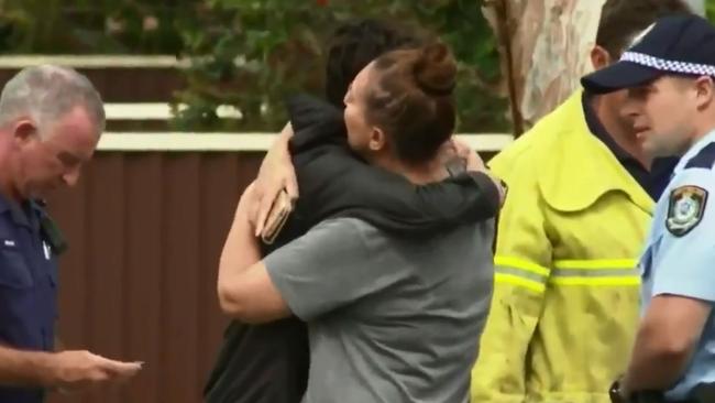 Shocked onlookers were seen consoling each other at the scene. Picture: 10News