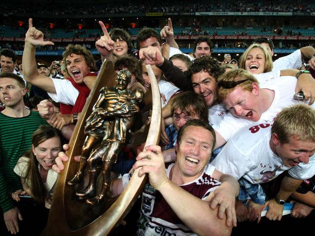 Toast of the Beaches: Manly skipper Matt Orford celebrates with fans.