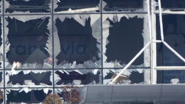 The blown out facade of the terminal is seen at Zaventem airport, one of the sites of two deadly attacks in Brussels. Picture: AP Photo/Peter Dejong