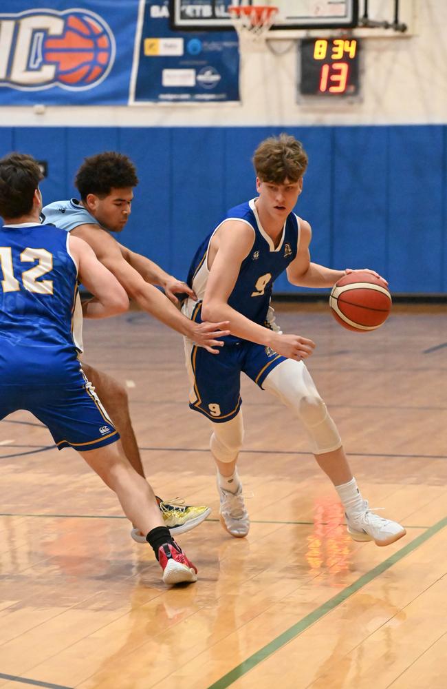 Brisbane Grammar's Lennon Bann applying pressure on Nudgee's Tyson Warren. Picture courtesy of Steve Carlisle.