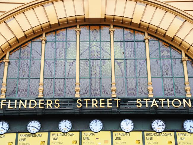 The clocks at Flinders Street station taken down in the 1980s and set to be replaced with digital screens, but they were reinstalled and automated after public outrage. Picture: HWT Library.