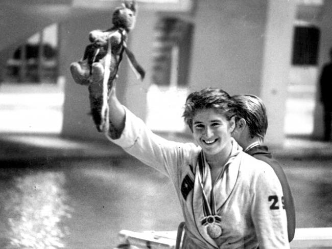 Swimmer Dawn Fraser after winning gold in 100 freestyle final at 1964 Tokyo Olympic Games.