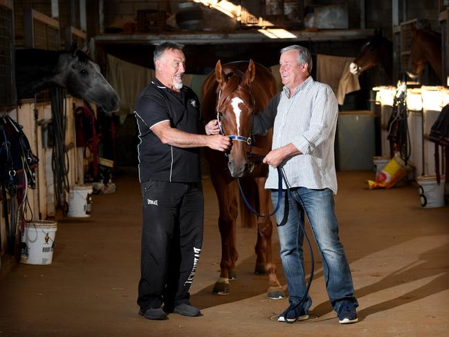 SA football legend and Payneham Norwood Union coachj Garry McIntosh and trainer Gordon Richards with their horse Gytrash. Picture: Tricia Watkinson