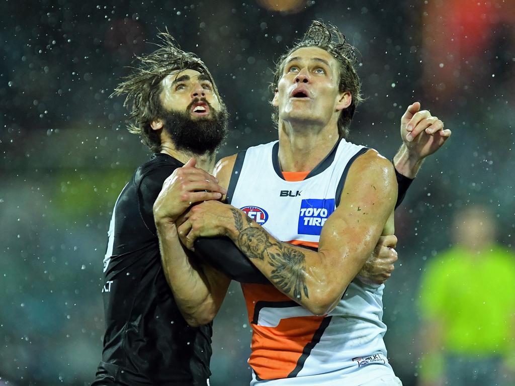 24/07/16 - AFL- Port Adelaide v GWS at Adelaide Oval.  Power big man Justin Westhoff battles with GWS player Rory Lobb in the ruck.Photo Tom Huntley