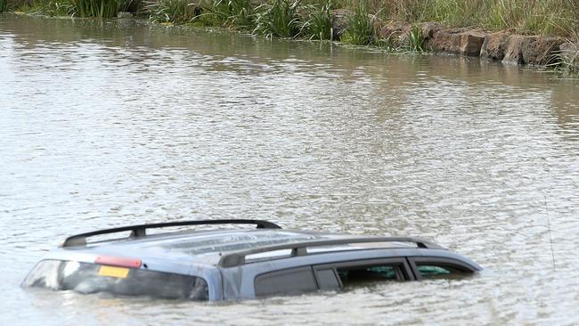 Akon Guode's who's car after it plunged into a lake. Picture: Mark Stewart