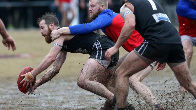 Rain, hail or shine, Field of View can be seen behind the lens every weekend of a typical EFNL season. Picture: Field of View Sports Photography.