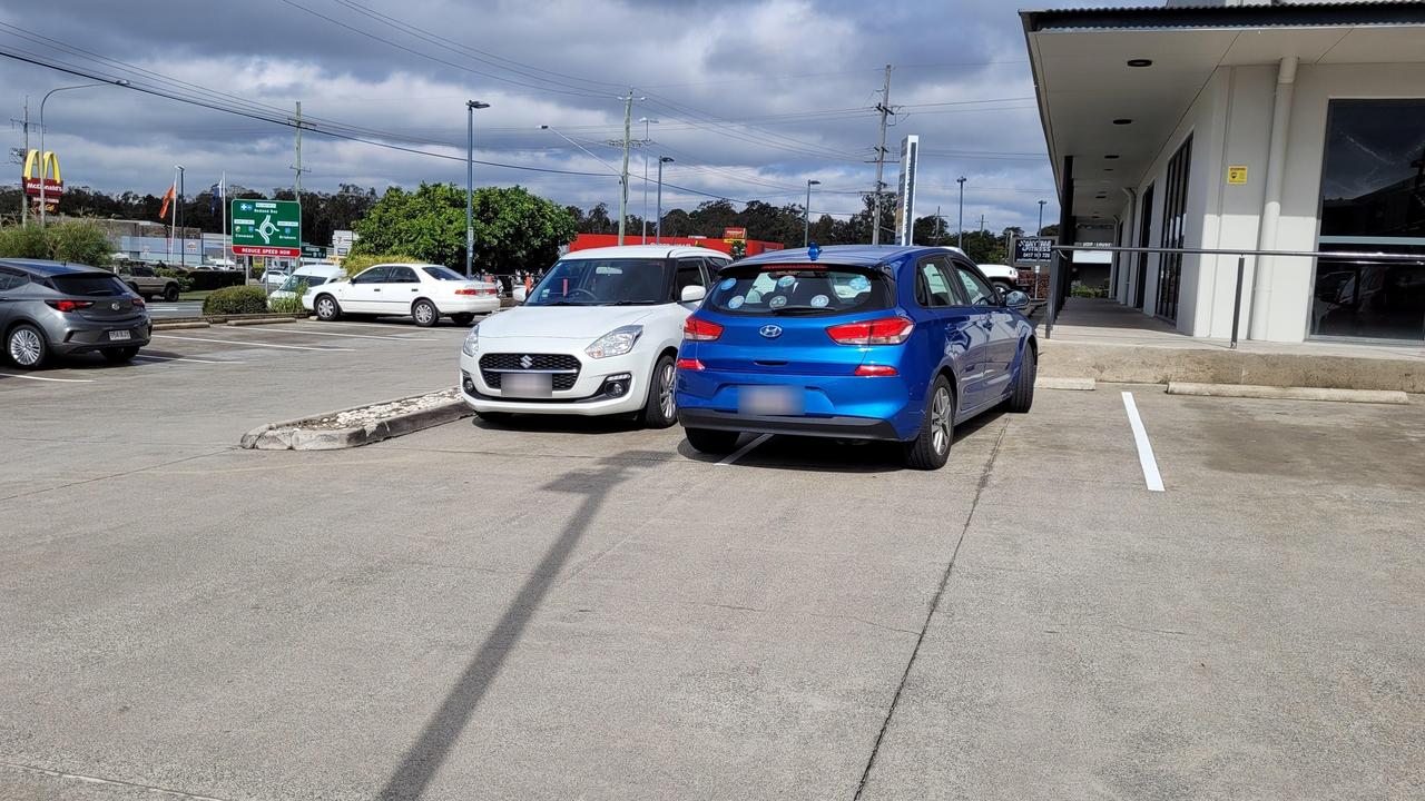 This Hyundai driver parked diagonally across the bay of the white Suzuki. Picture: Reddit