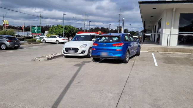 This Hyundai driver parked diagonally across the bay of the white Suzuki. Picture: Reddit