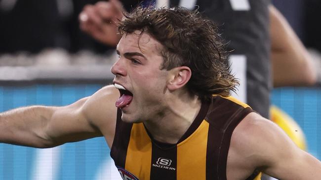 MELBOURNE, AUSTRALIA - JULY 20:  Nick Watson of the Hawks celebrates a goal during the round 19 AFL match between Hawthorn Hawks and Collingwood Magpies at Melbourne Cricket Ground, on July 20, 2024, in Melbourne, Australia. (Photo by Darrian Traynor/Getty Images)