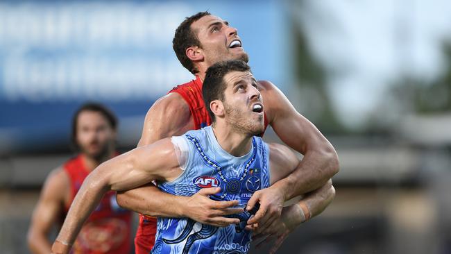 Jarrod Witts of the Suns and Tristan Xerri of the Kangaroos. Photo by Felicity Elliott/AFL Photos via Getty Images