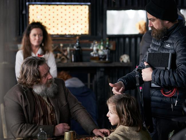 Director Justin Kurzel chats with actor Russell Crowe on the set of the True History of the Kelly Gang movie as Kurzel’s wife Essie Davis, who also stars in the film, looks on. Pictures courtesy: STAN ORIGINALS