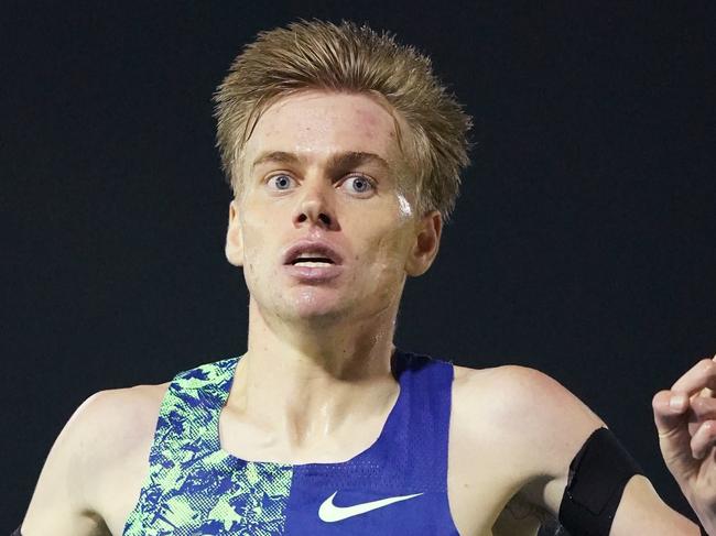 Stewart McSweyn wins the Mens 5000m race  during the Melbourne Track Classic at Lakeside Stadium in Melbourne, Thursday, February 6, 2020. (AAP Image/Michael Dodge) NO ARCHIVING, EDITORIAL USE ONLY