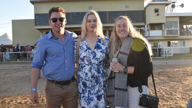 Spectators cheer on as they watch the A Grade Roma vs Condamine match at the Roma Rugby Races at Bassett Park. Picture: Chloe Cufflin.