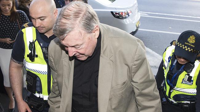 Australia's most senior Catholic, Cardinal George Pell, arriving at the Melbourne Magistrates’ Court today. Picture: AAP Image/Daniel Pockett