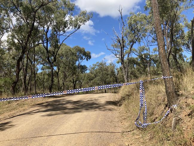 Picture of police tape sealing off Shannonvale Rd about 3km from crime scene which saw Mervyn and Maree Schwarz along with Graham Tighe shot and killed and the wounding of Ross Tighe at Bogie, Central Queensland