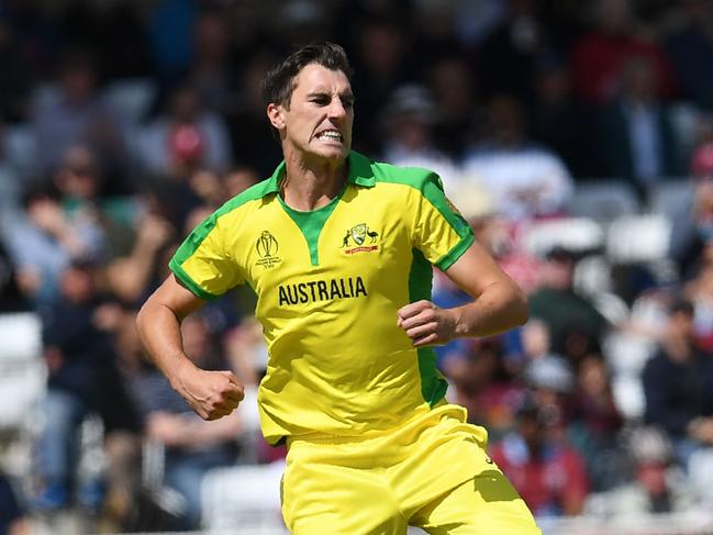 Australia's Pat Cummins celebrates dismissing West Indies' Evin Lewis for one.