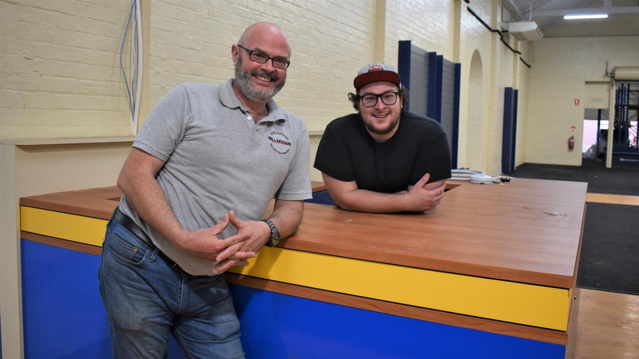 Rob and Dylan Williams at the site of the new store which will have a bar and cafe, board games room, pop culture and comic book displays and more.